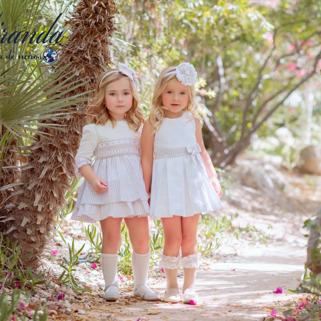 VESTIDO BLANCO  CON FAJIN DE LINEAS